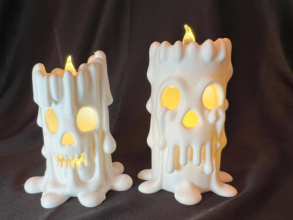 Halloween Skull Candle Pair: Gothic Melting Wax LED Decor