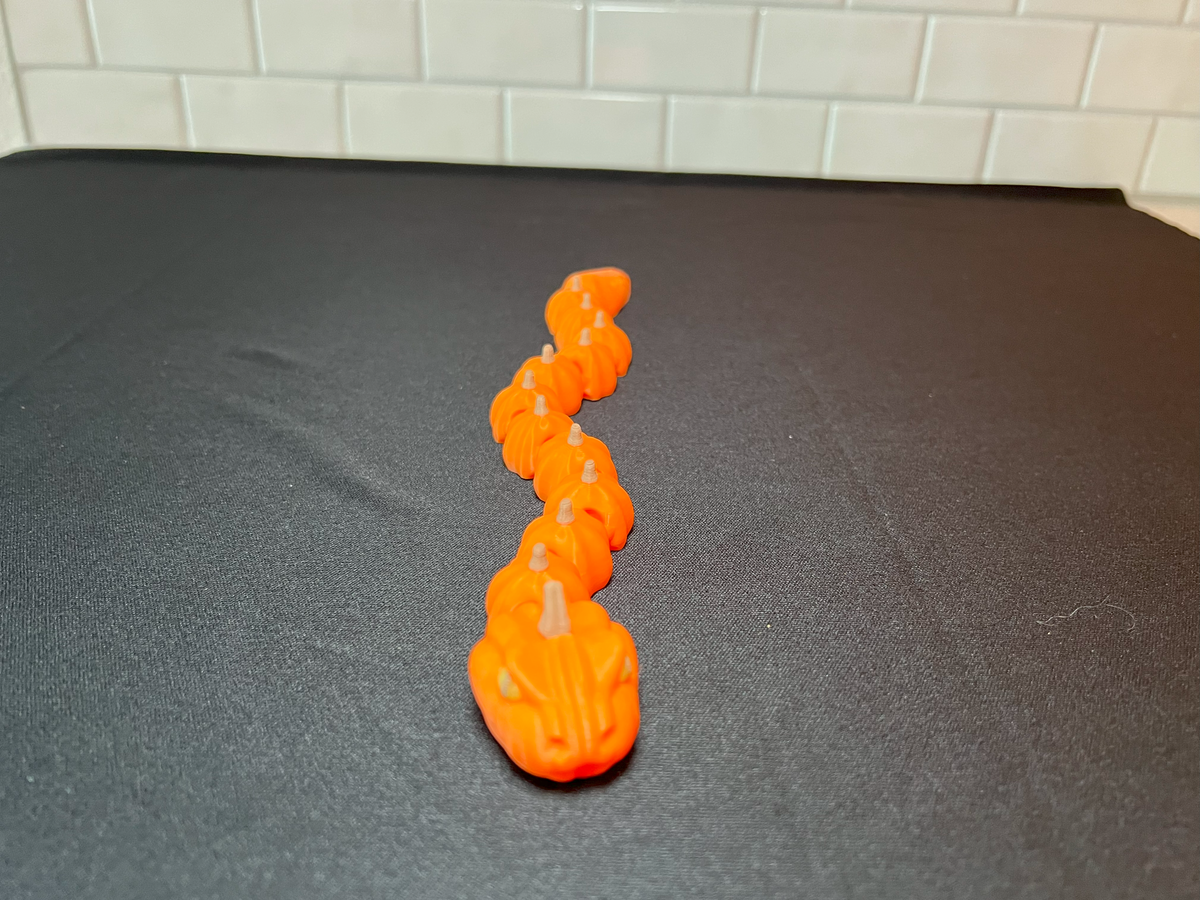 Flexible Pumpkin Snake | Unique Halloween Decoration & Glow Toy