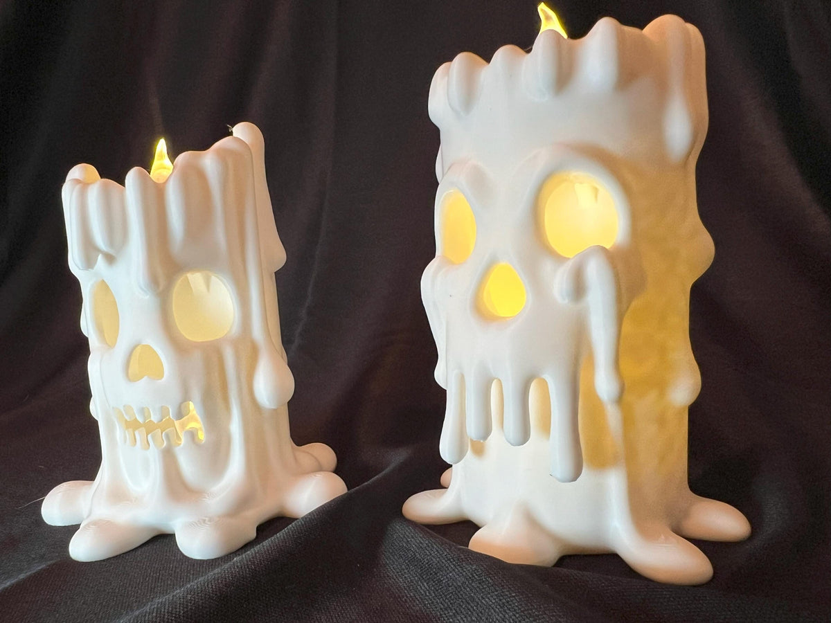 Halloween Skull Candle Pair: Gothic Melting Wax LED Decor