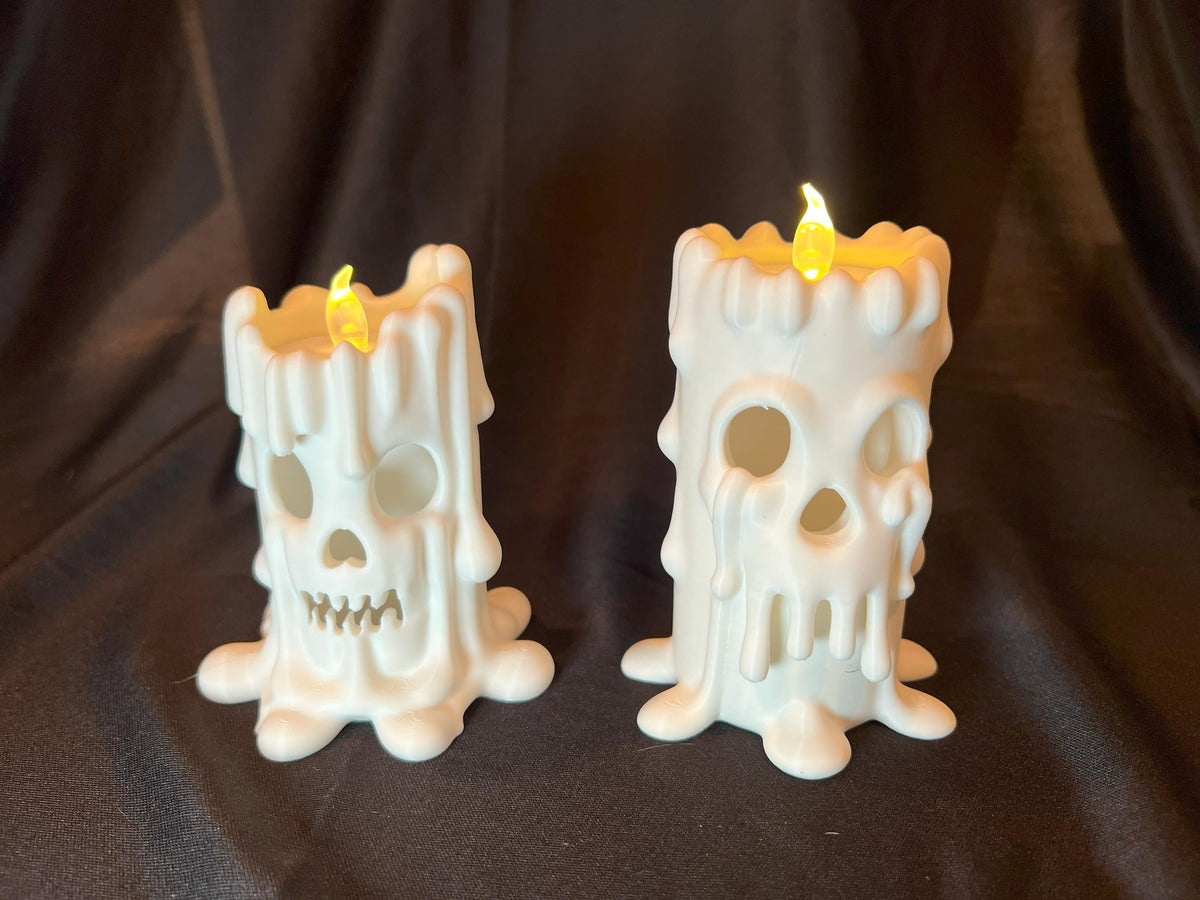 Halloween Skull Candle Pair: Gothic Melting Wax LED Decor