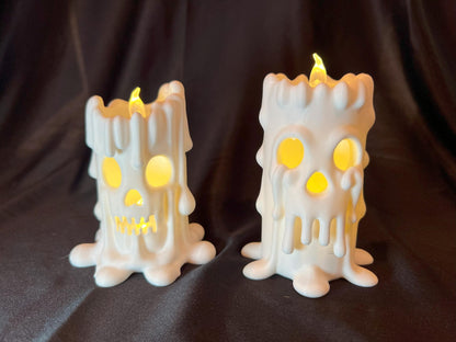 Halloween Skull Candle Pair: Gothic Melting Wax LED Decor